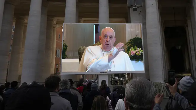 Pope Francis gives blessing via TV