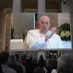 Pope Francis gives blessing via TV
