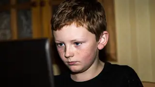 Young boy using a computer
