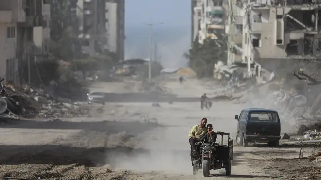 Palestinians drive through Gaza City