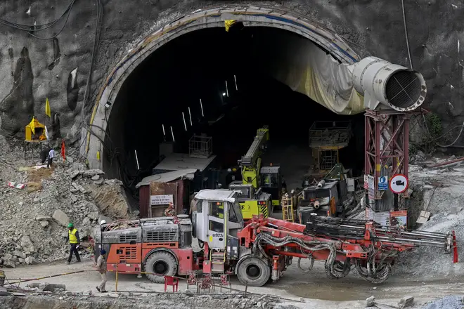 The workers have been trapped in a collapsed mountain tunnel for over two weeks