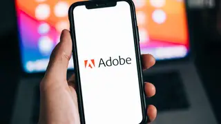 Smartphone with Adobe logo on the screen