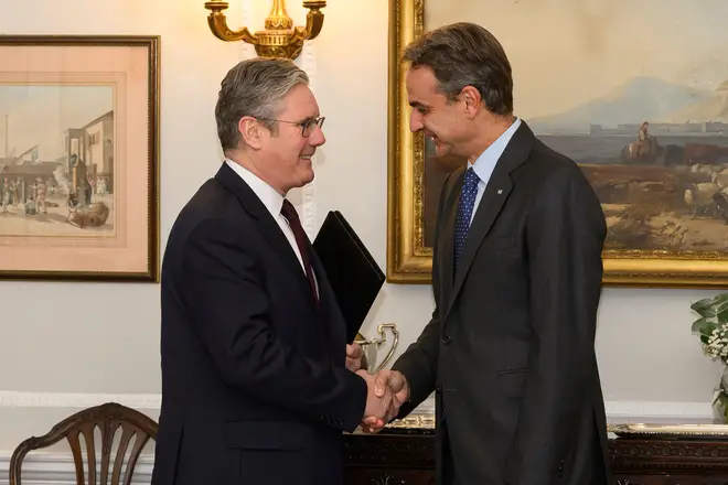 Britain's Labour Party Leader Keir Starmer, left, meets with the Prime Minister of Greece Kyriakos Mitsotakis in London, Nov. 27, 2023. (Leon Neal/Pool via AP)
