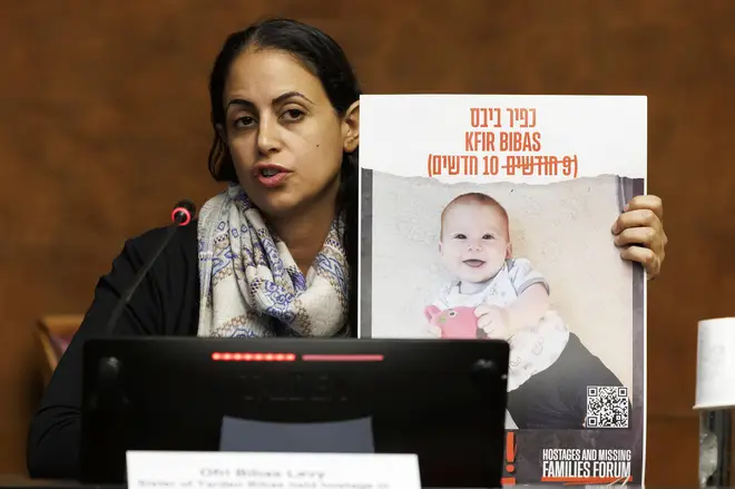 Ofri Bibas Levy, sister of Yarden Bibas, held hostage in Gaza with his wife, Shiri and two kids, Kfir and Ariel, talks to the media earlier this month
