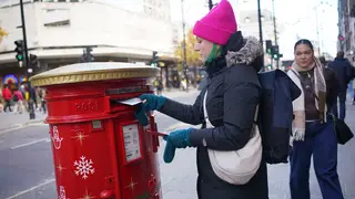 A Royal Mail Christmas postbox on Oxford Street