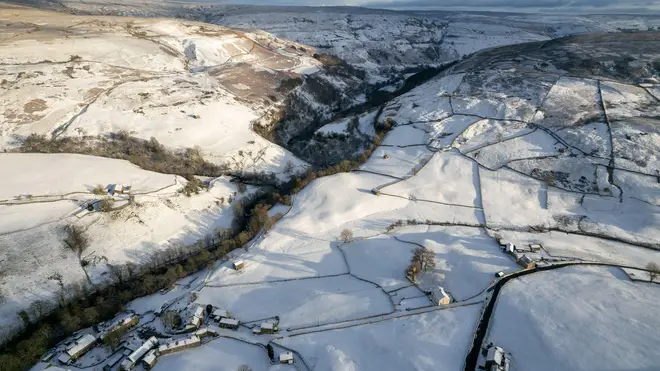 A coating of snow covers the farmland in the upper reaches of Swaledale near the isolated hamlets of Thwaite and Keld in the Yorkshire Dales National Park, giving the area a Christmas card look. Swaledale, North Yorkshire, UK. 30th Nov, 2023.