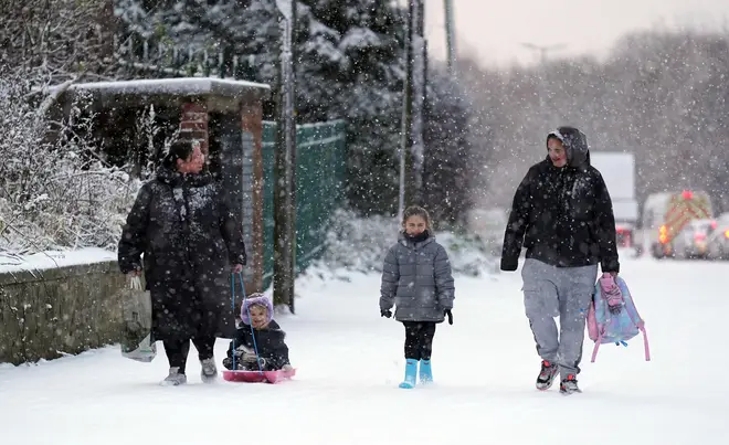 People in the snow in Gateshead.