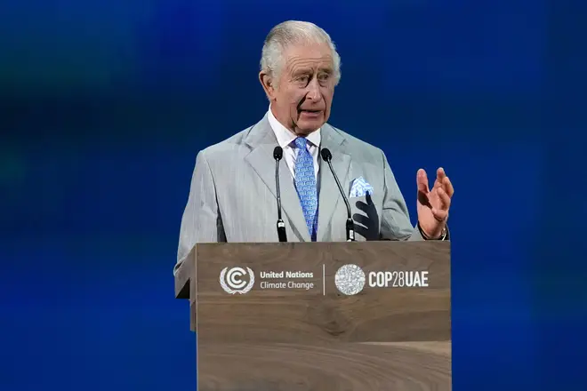 King Charles III speaks during an opening ceremony at the COP28