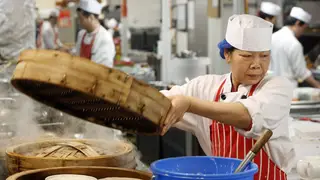 A restaurant kitchen worker