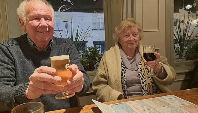 The couple looked thrilled with their free booze