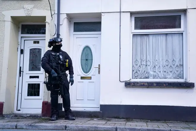 Armed police on Wyndham Street in Merthyr Tydfil after a 29-year-old woman was stabbed around 9.10am this morning in Aberfan