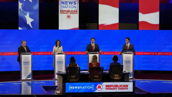 Florida governor Ron DeSantis, third from left, speaks as former New Jersey governor Chris Christie, left, former UN ambassador Nikki Haley and businessman Vivek Ramaswamy, right, watch during a Repub