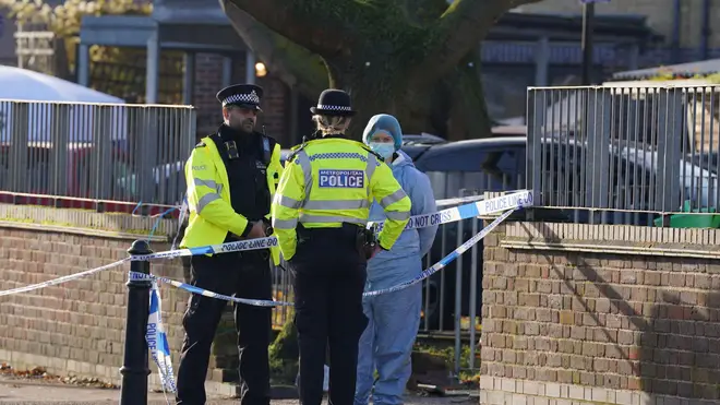 Police officers at the scene near Vine Close, Hackney, east London, following a shooting incident where a 42-year-old woman, named locally as Lianne Gordon died and two others were also found with gunshot wounds, December 6