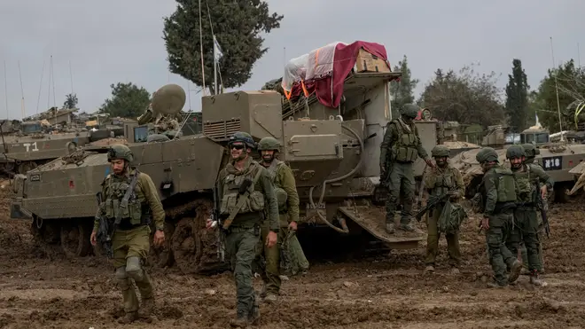 Israeli soldiers are seen at a staging area near the Israeli-Gaza border, in southern Israel, Thursday, Dec. 14, 2023 (file image) (AP Photo/Leo Correa)