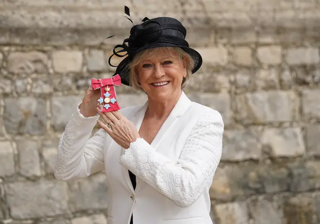 Sue Barker poses after she was made a CBE by the Duke of Cambridge at Windsor Castle on February 22, 2022 in Windsor