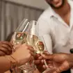 A champagne toast and New Year's Eve party (Alamy/PA)