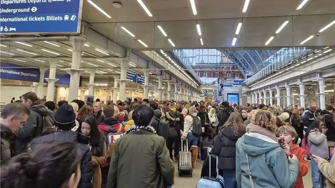 Devastated passengers trying to head north for Christmas flooded London Euston Station, where they were told to go home due to overhead wire damage exiting London at Watford Junction.