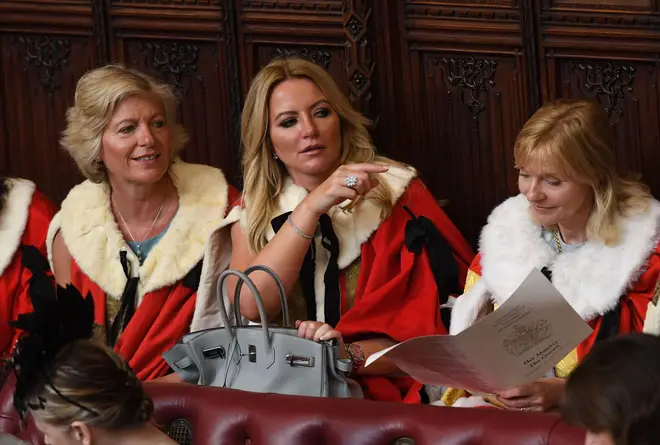 Baroness Michelle Mone waits for the start of the State Opening of Parliament in the Houses of Parliament in London on June 21, 2017