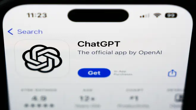 A ChapGPT logo is seen on a smartphone