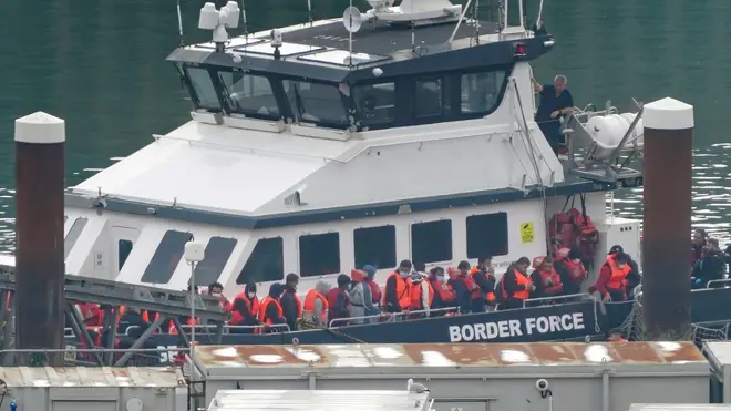 File photo of a group of people thought to be migrants are brought in to Dover, Kent, from a Border Force vessel following a small boat incident in the Channel, October 9, 2023