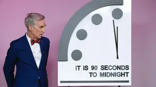 Science educator Bill Nye, looks at the 'Doomsday Clock,' shortly before the Bulletin of the Atomic Scientists announces the latest decision on the 'Doomsday Clock' minute hand.