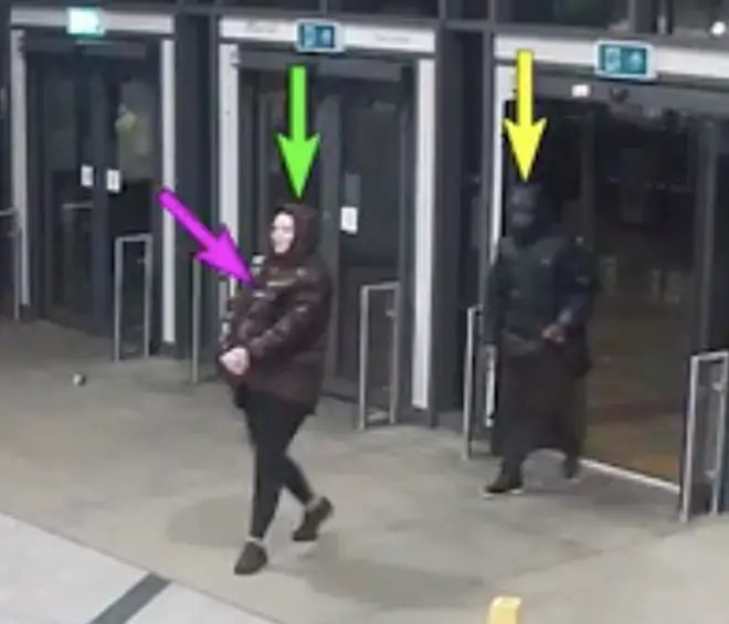 The footage shows the couple walking into the station with Marten taking the lead and gripping her waist with both hands, below a bump under her coat, where her baby was allegedly being concealed
