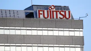 A Fujitsu sign on an office building