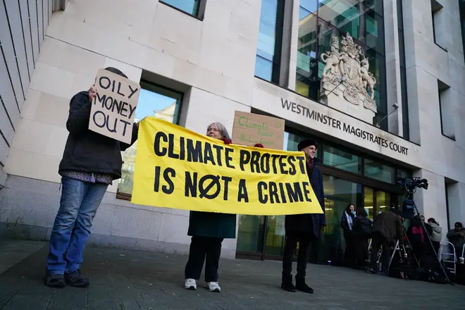Protesters outside Westminster Magistrates' Court, London, where activist Greta Thunberg and four other activists are charged with a public order offence during a protest in central London last year