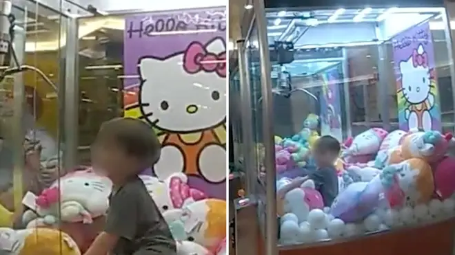 The boy was stuck in the claw machine after climbing into the prize dispenser.