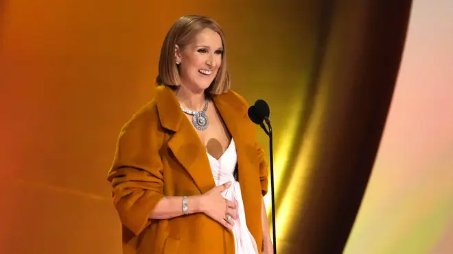 Celine Dion presents the award for album of the year during the 66th annual Grammy Awards.