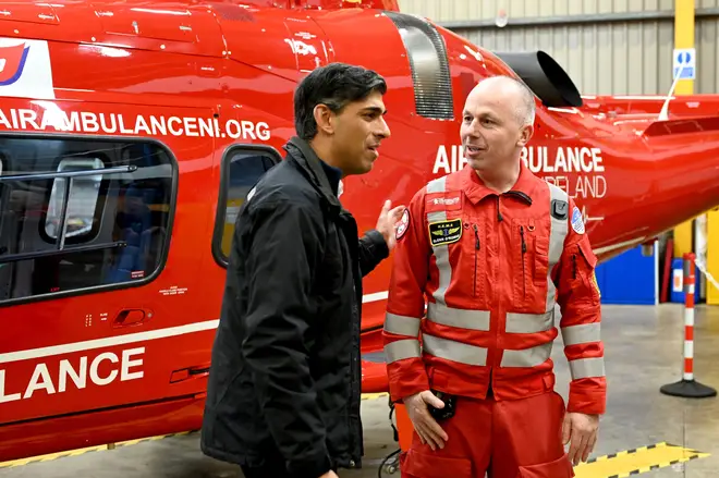 Prime Minister Rishi Sunak (left) during a visit to Air Ambulance Northern Ireland at their headquarters in Lisburn.