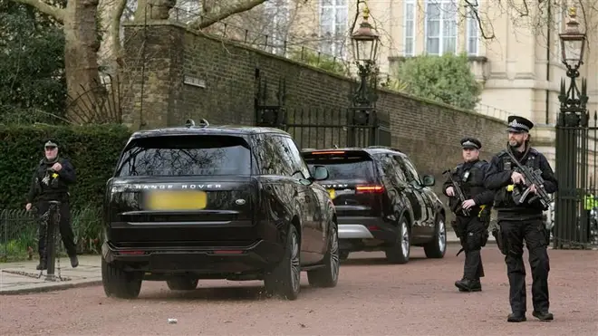 A convoy of cars made up of two blacked-out Land Rovers flanked by police vehicles pulled up to the palace just after 3pm this afternoon