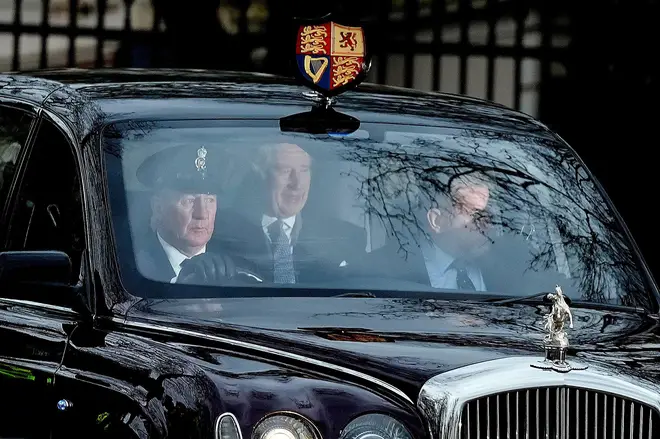 A smiling King Charles is seen leaving Clarence House