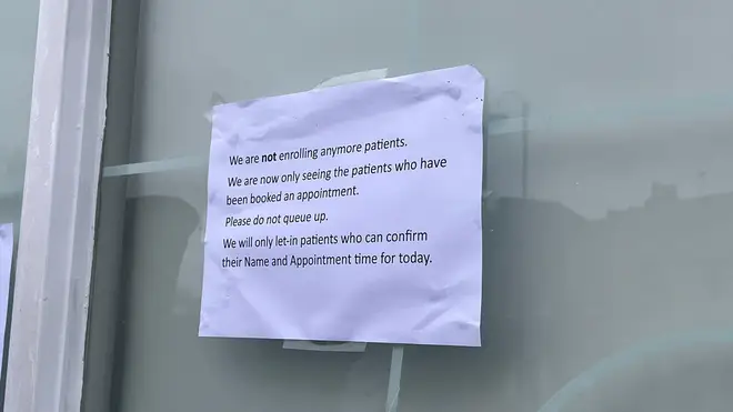 A sign outside St Pauls Dental Practice in Bristol says they are not enrolling patients anymore after a six-hour long queue formed outside