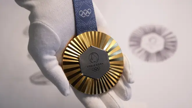 The Paris 2024 Olympic gold medal is presented to the press in Paris