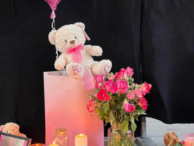 Mourners left pink toys and flowers in memory of the murdered transgender teen's favourite colour