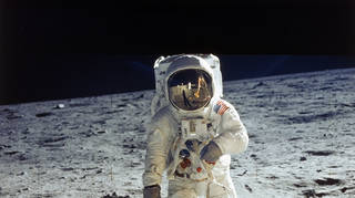 Apollo 11 astronaut Buzz Aldrin standing on moon