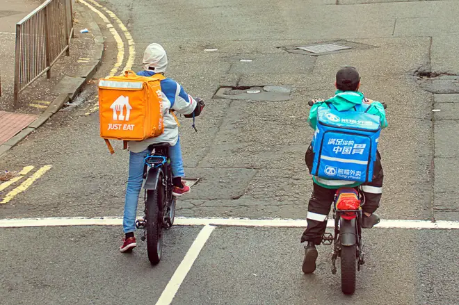 Food delivery riders in Glasgow, Scotland, August 17, 2023