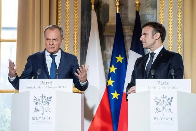 France's President Macron and Poland's Prime Minister Donald Tusk deliver a statement to the media as part of their meeting at the Elysee Palace in Paris, Monday