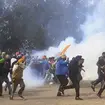 Farmers run for cover as police fire tear gas