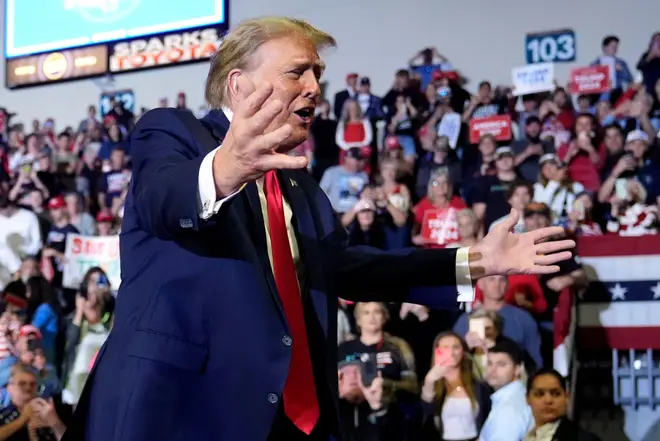 Republican presidential candidate former President Donald Trump gestures to the crowd after speaking at a Get Out The Vote rally at Coastal Carolina University in Conway, S.C., Saturday