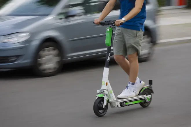 Man riding an e-scooter