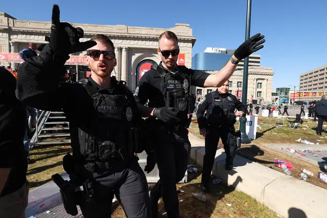 Law enforcement responds to a shooting at Union Station during the Kansas City Chiefs Super Bowl LVIII victory parade on February 14, 2024 in Kansas City, Missouri