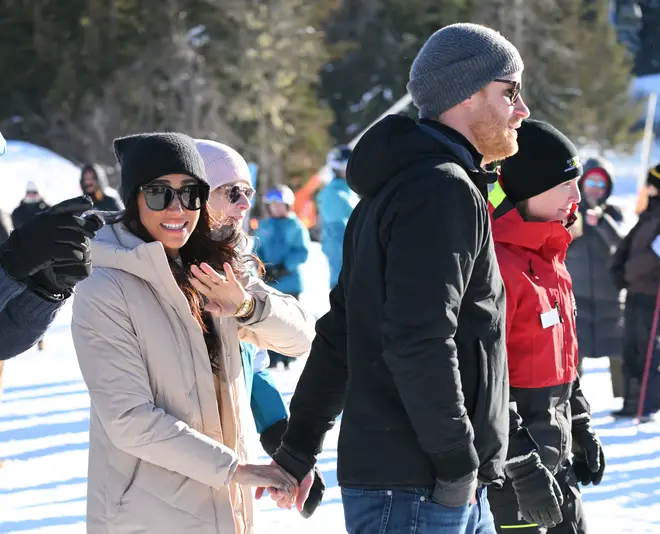 The pair were pictured holding hands on the slopes.