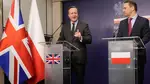 David Cameron addresses reporters on a visit to Warsaw