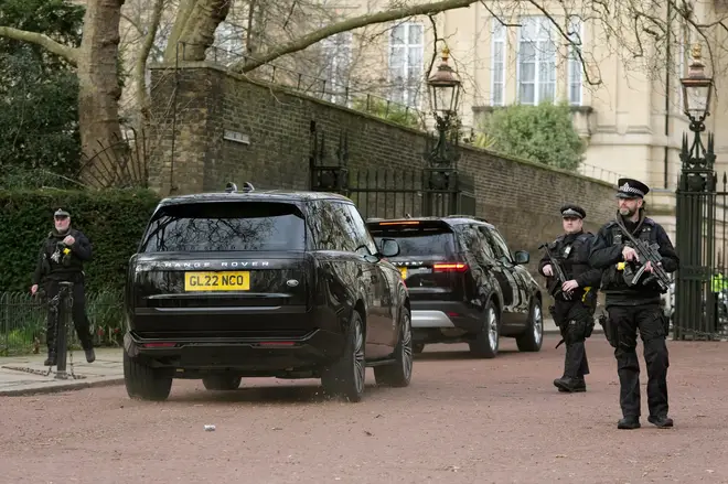 A convoy of carscarrying Prince Harry arrive at Clarence House following the announcement of King Charles III's cancer diagnosis, in London, Tuesday, Feb. 6, 2024