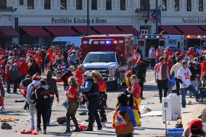 Police clear the area following a shooting at the Kansas City Chiefs NFL football Super Bowl celebration in Kansas City, Mo., Wednesday