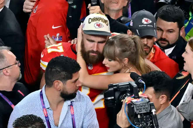 Kansas City Chiefs tight end Travis Kelce (87) embraces Taylor Swift after the NFL Super Bowl 58 football game against the San Francisco 49ers, Sunday
