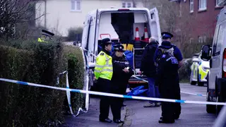 Police at the scene in Blaise Walk, Sea Mills, Bristol, where a woman has been arrested on suspicion of murder after three children were found dead at a property