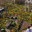 People look down at a protest in Madrid, Spain as hundreds of farmers drove their tractors into the capital as part of ongoing protests against European Union and local farming policies (Manu Fernande